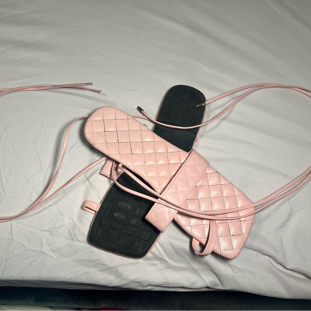 Pink lace up sandals with toe strap